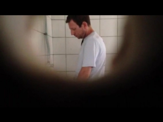 guy messing around in the toilet